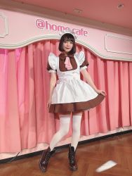  1girl at-home_cafe brown_dress dress highres maid nakagawa_shouko photo_(medium) socks white_socks 