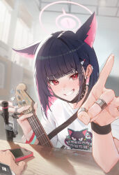  1girl 1other absurdres anger_vein animal_ears bass_guitar black_collar black_hair black_mask black_wristband blue_archive blurry blurry_background cat_ears cat_girl clenched_teeth collar colored_inner_hair commentary ear_bar extra_ears guan_byeol hair_ornament hairclip halo highres holding holding_instrument indoors instrument jewelry kazusa_(band)_(blue_archive) kazusa_(blue_archive) looking_at_viewer mask mask_lift mouth_mask multicolored_hair official_alternate_costume phone pink_hair pink_halo pov pov_hands print_shirt red_eyes ring shirt teeth upper_body white_shirt 