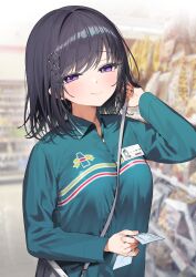  1girl absurdres bag black_hair blurry blurry_background blush breasts character_name closed_mouth collared_jacket commentary_request convenience_store green_jacket highres holding holding_paper id_card indoors itohana jacket long_sleeves looking_at_viewer medium_hair original paper purple_eyes shop smile solo standing translation_request 