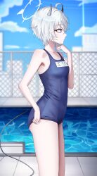  1girl absurdres ahoge alternate_costume blue_archive blue_one-piece_swimsuit blurry blurry_background breasts chain-link_fence collarbone commentary demon_horns demon_tail erika_(blue_archive) fence from_side grey_hair halo highres horns looking_ahead name_tag old_school_swimsuit one-piece_swimsuit pale_skin polcoco pool profile school_swimsuit short_hair small_breasts solo swimsuit tail 