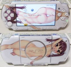  1girl armpits arms_up ass blush brown_eyes brown_hair buttons censored convenient_censoring cropped handheld_game_console imazon loli navel no_humans nude photo_(medium) playstation_portable product_placement sony twintails  rating:Questionable score:181 user:danbooru