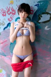  1girl asics bikini breasts cleavage highres kubo_yurika photo_(medium) side-tie_bikini_bottom swimsuit 