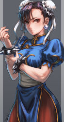  1girl arm_up blue_dress bracelet breasts brown_eyes brown_hair capcom china_dress chinese_clothes chun-li commentary_request cowboy_shot double_bun dress earrings gold_trim grey_background hair_bun hapchi highres holding_own_arm jewelry looking_at_viewer medium_breasts outside_border pelvic_curtain puffy_short_sleeves puffy_sleeves sash short_hair short_sleeves signature solo spiked_bracelet spikes standing straight-on street_fighter white_sash 