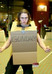 1boy artist_request blurry box cardboard_box cardboard_box_gundam carpet copyright_name cosplay cosplay_photo cowboy_shot depth_of_field epic gundam id_tag in_container indoors long_sleeves looking_at_viewer lowres male_focus manly meme photo_(medium) real_life solo standing rating:Sensitive score:38 user:danbooru