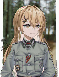  1girl blonde_hair blurry closed_mouth cross depth_of_field forest girls&#039;_frontline grey_jacket hair_ornament highres huihuang_rongyao iron_cross jacket long_hair long_sleeves military_uniform nature ppk_(girls&#039;_frontline) solo swastika uniform wehrmacht yellow_eyes 
