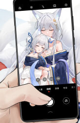  2girls absurdres animal_ear_fluff animal_ears azur_lane bare_shoulders blue_kimono blue_ribbon breasts cellphone cleavage closed_eyes commander_(azur_lane) facing_viewer feet_out_of_frame fingernails fox_ears fox_girl fox_tail grey_hair hair_ornament hair_ribbon hand_on_another&#039;s_back hand_on_another&#039;s_chest highres holding holding_phone japanese_clothes kimono long_hair mole mole_under_eye multiple_girls multiple_tails off_shoulder phone pov qing_wu ribbon shinano-chan_(azur_lane) shinano_(azur_lane) sitting sitting_on_lap sitting_on_person skirt sleeping smartphone smile socks tail taking_picture thighhighs twintails white_skirt white_socks white_thighhighs wide_sleeves 