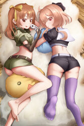  2girls ahoge ass bare_legs barefoot bernie_(brown_dust) between_legs black_jacket black_ribbon black_shorts blush brown_dust_2 brown_eyes brown_gloves brown_hair controller cropped_jacket eyebrows_hidden_by_hair game_controller gloves green_jacket green_shorts hair_between_eyes hair_ribbon highres holding holding_controller holding_game_controller jacket lying multiple_girls on_side on_stomach open_mouth partially_fingerless_gloves pillow purple_thighhighs red_eyes ribbon rigenette_(brown_dust) rug scopedog_12 short_shorts shorts smile soles thighhighs toes tongue tongue_out yellow_ribbon 