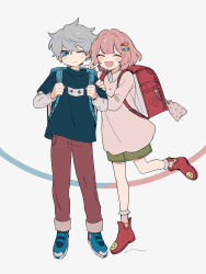  1boy 1girl backpack bag bag_charm blue_eyes blush charm_(object) closed_eyes collared_shirt full_body grey_hair hair_ornament hairclip hand_on_another&#039;s_shoulder highres layered_sleeves long_sleeves looking_to_the_side maco22 one_eye_closed open_mouth original pants pink_hair randoseru shirt shoes short_hair short_over_long_sleeves short_sleeves skirt smile sneakers socks standing standing_on_one_leg sweat v 