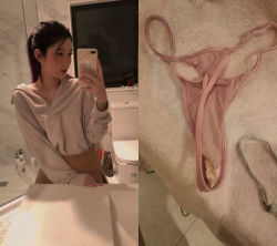  1girl asian bathroom cellphone dirty_panties highres panties phone photo_(medium) smartphone theft thong underwear 