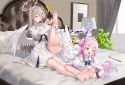  2girls angel_wings bare_legs barefoot bed black_neckerchief blue_archive chuck_(harfmoondark) cruciform_halo feathered_wings feet flower hair_bun hair_flower hair_ornament halo highres light_brown_hair low_wings mika_(blue_archive) multiple_girls nagisa_(blue_archive) neckerchief no_shoes on_bed pillow pink_hair pink_halo single_side_bun soles tickling white_wings wing_ornament wings yellow_halo yuri 
