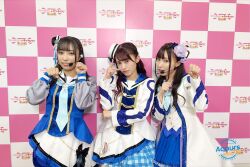 3girls aida_rikako costume dress indoors kobayashi_aika looking_at_viewer multiple_girls photo_(medium) smile standing suzuki_aina_(voice_actor) voice_actor watermark