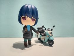  absurdres blue_background blue_hair cellphone highres motor_vehicle motorcycle nendoroid phone shima_rin yurucamp  rating:Sensitive score:0 user:MAAB