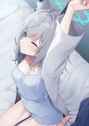  1girl absurdres animal_ear_fluff animal_ears arm_up armpits barefoot bed_sheet blue_archive blue_camisole blue_eyes blue_halo breasts camisole cardigan commentary_request from_above grey_cardigan grey_hair halo highres making-of_available medium_breasts medium_hair official_alternate_costume on_bed one_eye_closed outstretched_arm sasakichi_(ssk_chi) shiroko_(blue_archive) sitting solo variant_set waking_up wolf_ears 
