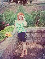  1girl camisole cosplay hat leaning nami_(one_piece) nami_(one_piece)_(cosplay) one_piece orange_hair photo_(medium) sandals short_hair shorts solo straw_hat  rating:Sensitive score:3 user:Eindragon