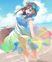  1girl arched_back beach blue_dress blue_eyes breasts brown_hair closed_mouth day dress go-toubun_no_hanayome hat head_wreath headphones headphones_around_neck highres hirokiku holding holding_clothes holding_hat horizon long_hair looking_at_viewer looking_back medium_breasts nakano_miku ocean outdoors sky solo standing 