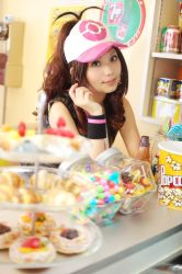  baseball_cap candy cosplay creatures_(company) food game_freak hat hilda_(pokemon) nintendo photo_(medium) pokemon pokemon_bw popcorn  rating:Sensitive score:38 user:yoyo777