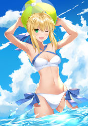  1girl ;d absurdres ahoge armpits arms_up artoria_pendragon_(fate) artoria_pendragon_(swimsuit_archer)_(fate) artoria_pendragon_(swimsuit_archer)_(first_ascension)_(fate) asato_(fadeless) ball beachball bikini blonde_hair blue_ribbon blue_sky braid breasts cleavage cloud collarbone cowboy_shot crown_braid day fate/grand_order fate_(series) green_eyes groin hair_between_eyes halterneck highres holding holding_ball looking_at_viewer navel ocean one_eye_closed open_mouth outdoors ribbon shiny_skin side-tie_bikini_bottom sidelocks sky small_breasts smile solo standing swimsuit wading white_bikini  rating:Sensitive score:9 user:danbooru
