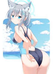  1girl adjusting_clothes adjusting_swimsuit animal_ear_fluff animal_ears ass black_one-piece_swimsuit blue_archive blue_eyes blue_sky breasts cloud commentary_request competition_swimsuit cross_hair_ornament extra_ears from_behind grey_hair hair_ornament halo highres horizon looking_at_viewer looking_back low_ponytail medium_breasts medium_hair mismatched_pupils mizuki_(kogetsu-tei) multicolored_clothes multicolored_swimsuit ocean one-piece_swimsuit shiroko_(blue_archive) shiroko_(swimsuit)_(blue_archive) sky solo swimsuit 