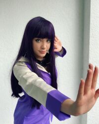  1girl blurry blurry_background cosplay cuban_(nationality) female_focus fishnets green_eyes highres hyuuga_hinata hyuuga_hinata_(cosplay) indoors long_hair looking_at_viewer naruto_(series) photo_(medium) purple_hair solo standing staryuuki 