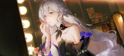  1girl bare_shoulders bracelet cosmetics detached_sleeves earrings hair_between_eyes halo hand_up head_wings highres holding holding_lipstick_tube honkai:_star_rail honkai_(series) indoors jewelry lipstick lipstick_tube lirisy long_hair looking_to_the_side makeup no_gloves parted_lips robin_(honkai:_star_rail) short_sleeves single_earring sitting solo two-tone_dress white_wings wings 