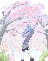  1girl arm_up black_footwear black_shorts blue_hair blue_skirt cherry_blossoms closed_eyes closed_mouth commentary_request falling_petals feet_out_of_frame garryaoki grass grey_hoodie hair_bun hand_on_own_arm highres hood hoodie inkling inkling_girl inkling_player_character nintendo official_style outdoors petals pink_petals print_hoodie shorts shorts_under_skirt skirt solo splatoon_(series) stretching tentacle_hair tree 
