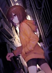  1girl ahoge air_conditioner alley bike_shorts brown_hair closed_mouth commentary_request cowboy_shot drainpipe drawstring feet_out_of_frame hair_between_eyes hand_in_pocket highres holding holding_sword holding_weapon hood hood_down hoodie linne long_sleeves looking_at_viewer outdoors red_eyes short_hair solo suzunashi sword under_night_in-birth weapon yellow_hoodie  rating:General score:13 user:danbooru
