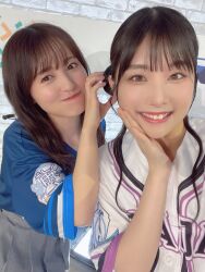 2girls aida_rikako black_hair costume indoors looking_at_viewer misaki_nako multiple_girls photo_(medium) selfie smile standing voice_actor