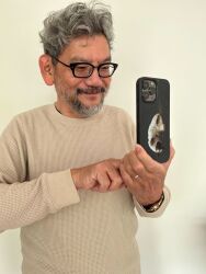  1boy absurdres anno_hideaki birthday cat cellphone director gainax glasses grey_hair highres phone photo_(medium) 