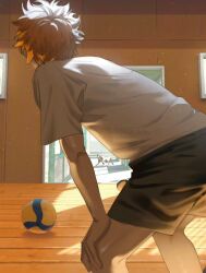  1boy bare_arms bare_legs black_shorts calico cat chinese_commentary commentary_request cowboy_shot doorway from_behind gym haikyuu!! hallway hands_on_own_knees highres hinata_shouyou indoors light_particles looking_afar lucia_(2023wjdh1123) male_focus messy_hair orange_hair shirt short_hair short_sleeves shorts solo sunlight t-shirt volleyball white_shirt window 