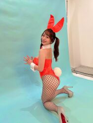  1girl leotard photo_(medium) playboy_bunny red_leotard shiraishi_marina standing_on_knees  rating:Sensitive score:0 user:nao10