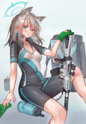 1girl absurdres animal_ears bag bike_shorts biker_clothes blue_archive blue_eyes blue_halo breasts canteen cleavage covered_erect_nipples cross_hair_ornament earrings extra_ears feet_out_of_frame gradient_background grey_background grey_hair hair_ornament halo highres invisible_chair jewelry kaguura_(kagu) knee_up medium_breasts medium_hair no_tail official_alternate_costume shiroko_(blue_archive) shiroko_(cycling)_(blue_archive) short_sleeves simple_background sitting skin_tight solo sportswear sweat weapon weapon_request wolf_ears 
