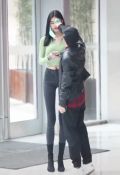  1boy 1girl animated asian black_hair denim height_difference japan mask photo_(medium) tagme tall thigh_gap walking video  rating:Sensitive score:9 user:baron_harkbonen