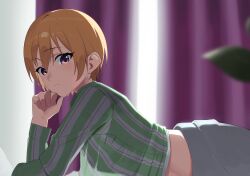  1girl absurdres blonde_hair blurry blush breasts curtains depth_of_field fingernails garuku1120 green_shirt highres idolmaster idolmaster_shiny_colors indoors light_smile looking_at_viewer looking_to_the_side lying on_stomach saijo_juri see-through_silhouette shirt short_hair small_breasts solo 