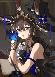  1girl absurdres amiya_(arknights) animal_ear_fluff animal_ears apple arknights bare_shoulders bell bell_earrings black_dress black_hat blue_eyes blurry blurry_foreground braid brown_hair commentary_request depth_of_field dress earrings ears_through_headwear food frills fruit hair_between_eyes hand_up hat highres holding holding_food holding_fruit inkwell jewelry long_hair looking_at_viewer open_mouth rabbit_ears solo very_long_hair witch_hat yume-dream 