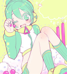  1girl azurite0012 blush candle cherry fang food fruit green_eyes green_hair hatsune_miku headphones high_collar holding holding_food holding_fruit jacket jersey_(module) knees_up long_sleeves midriff miniskirt one_eye_closed open_mouth project_diva_(series) skirt smile socks solo track_jacket vocaloid 