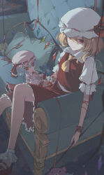  1girl absurdres ascot blonde_hair bobby_socks closed_mouth collared_shirt commentary_request couch crystal film_grain flandre_scarlet foot_out_of_frame frilled_skirt frilled_sleeves frills fumo_(doll) hat hat_ribbon highres huaano looking_at_viewer medium_hair mob_cap on_couch pillow pointy_ears red_eyes red_footwear red_ribbon red_skirt red_vest remilia_scarlet ribbon shirt short_sleeves sitting skirt socks stuffed_animal stuffed_toy teddy_bear touhou vest white_shirt white_socks wings wrist_cuffs yellow_ascot 