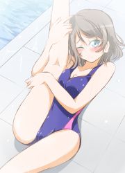  1girl blue_one-piece_swimsuit blush breasts brown_hair cleavage competition_swimsuit frown highres kneepits looking_at_viewer love_live! love_live!_sunshine!! matsuoka_michihiro medium_breasts one-piece_swimsuit one_eye_closed poolside solo stretching swimsuit thighs watanabe_you water wet 