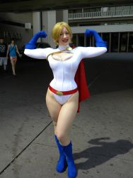  1girl absurdres bellechere belt blonde_hair breasts cape cleavage cleavage_cutout clothing_cutout cosplay dc_comics gloves highres leotard photo_(medium) power_girl power_girl_(cosplay) 