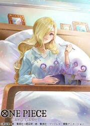 1girl bad_food blonde_hair blue_dress blue_eyes commentary_request copyright_name dress fork hair_over_one_eye holding holding_fork long_hair looking_at_viewer official_art on_bed one_piece picture_frame pink_lips pisuke plate smile solo vinsmoke_sora wavy_ends 