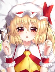  1girl ascot blonde_hair flandre_scarlet food hand_up hat hat_ribbon lying meuneyu mob_cap on_back on_bed open_mouth pocky pocky_day red_eyes red_ribbon ribbon solo touhou upper_body wrist_cuffs yellow_ascot 