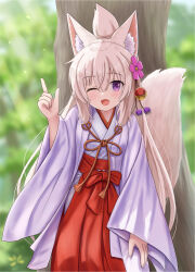  1girl ;d absurdres animal_ear_fluff animal_ears blurry blurry_background blush commentary_request day depth_of_field fang folded_ponytail fox_ears fox_girl fox_tail hair_between_eyes hakama hand_up highres index_finger_raised iroha_(iroha_matsurika) japanese_clothes kimono koyoi_(iroha_(iroha_matsurika)) light_brown_hair long_sleeves looking_at_viewer miko one_eye_closed open_mouth original outdoors purple_eyes red_hakama sleeves_past_wrists smile solo tail tree white_kimono wide_sleeves 