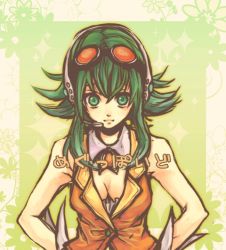 Rule 34 | 1girl, bad id, bad pixiv id, breasts, cleavage, goggles, green eyes, green hair, gumi, hands on own hips, headphones, matching hair/eyes, nanase shie, short hair, solo, vocaloid