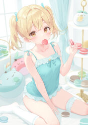 1girl blonde_hair breasts camisole curtains food food_in_mouth green_camisole highres holding holding_food indoors looking_at_viewer macaron original panties pastry rebun sitting small_breasts socks solo stuffed_toy thigh_strap twintails underwear wariza white_panties white_socks window yellow_eyes