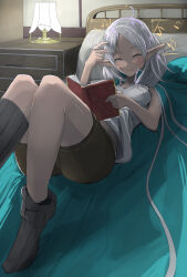 Rule 34 | 1girl, ahoge, bed, black socks, book, brown shorts, closed eyes, closed mouth, desk lamp, drawer, elf, hand up, highres, holding, holding book, humming, indoors, lamp, medium hair, mushoku tensei, musical note, on bed, pillow, playing with own hair, pointy ears, shirt, shorts, sleeveless, smile, socks, solo, sureddo-mannan, sylphiette (mushoku tensei), white hair, white shirt
