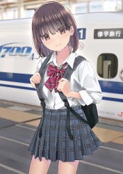 Rule 34 | 1girl, backpack, bad id, bad twitter id, bag, blue skirt, blurry, blurry background, blush, bow, bowtie, brown eyes, brown hair, chikuwa (odennabe), closed mouth, collared shirt, head tilt, highres, long sleeves, looking at viewer, original, plaid, plaid bow, plaid bowtie, plaid neckwear, plaid skirt, pleated skirt, red bow, red bowtie, school uniform, shirt, short hair, skirt, smile, solo, standing, train, train station, white shirt