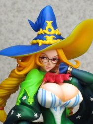 Rule 34 | 1girl, animal, belt, braid, breasts, brown hair, cleavage, female focus, figure, glasses, grand knights history, hat, huge breasts, jewelry, long hair, muse cromwell, red eyes, ring, smile, solo, wand, witch hat