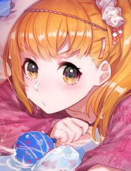 Rule 34 | 1girl, blush, closed mouth, hair ornament, looking at viewer, lying, mika pikazo, on stomach, orange eyes, orange hair, original, pink sweater, ponytail, solo, sweater
