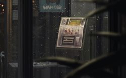 Rule 34 | absurdres, blood, blurry, blurry foreground, cigarette, depth of field, guweiz, highres, no humans, original, phone booth, plant, sign, wanted, water drop, wet