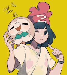 Rule 34 | 1girl, ;), beanie, black hair, closed mouth, commentary, creatures (company), eyelashes, floral print, game freak, gen 7 pokemon, grey eyes, hands up, hat, highres, mei (manjunii), nintendo, on shoulder, one eye closed, pointing, pokemon, pokemon (creature), pokemon on shoulder, pokemon sm, rowlet, selene (pokemon), shirt, short sleeves, smile, tied shirt, upper body, yellow background, zzz