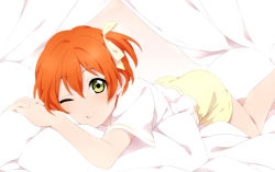 Rule 34 | 10s, 1girl, ;), bed, bow, canopy bed, green eyes, hair between eyes, hair bow, hoshizora rin, love live!, love live! school idol project, lying, on stomach, one eye closed, orange hair, pillow, sekina, short hair, shorts, side ponytail, smile, solo, yellow bow, yellow shorts